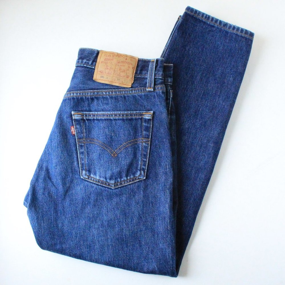 90s vintage Levi's 501 custom tapered dark wash crop jeans